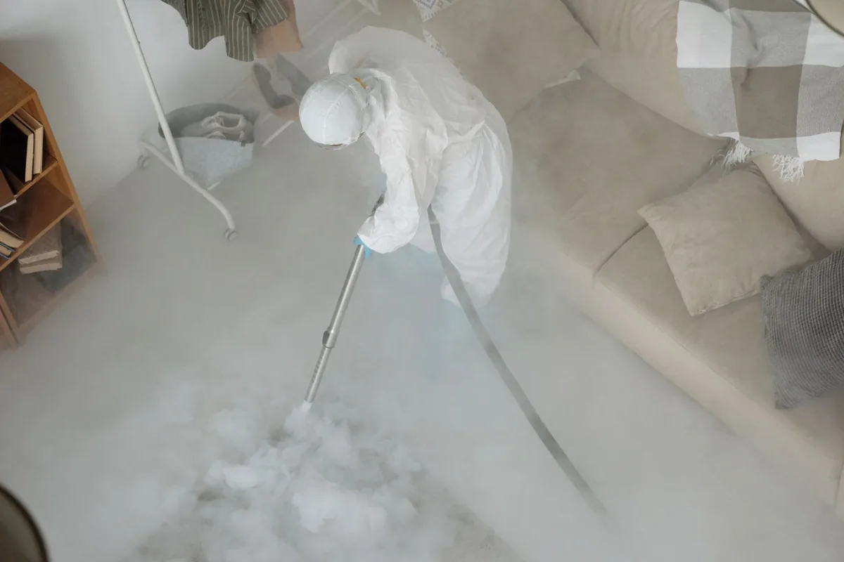 Biohazard cleanup technician in protective equipment, Preakness, NJ